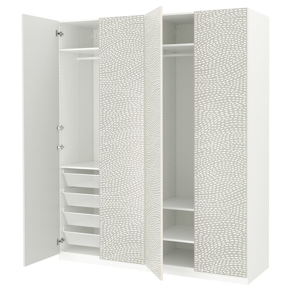 A white ikea PAX wardrobe with a patterned door and open compartments. It shelves, a clothes rail, and mesh baskets.