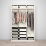 White PAX closet with clothes, baskets, and drawers. Hang and store neatly.