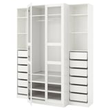 A white ikea PAX wardrobe with sliding doors and glass-fronted storage compartments, offering a modern, minimalist design.