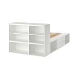 White PLATSA bed frame with open shelves and drawers for storage, modern minimalist design.