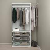 Modern PLATSA wardrobe with coats, adjustable feet, hanging rod, and metal drawers.