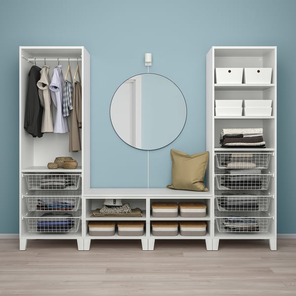 Modern white storage setup: wardrobe, shelves, and bench. Hangs clothes, organizes accessories, and fits under sloped ceilings.