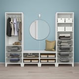 Modern white storage setup: wardrobe, shelves, and bench. Hangs clothes, organizes accessories, and fits under sloped ceilings.