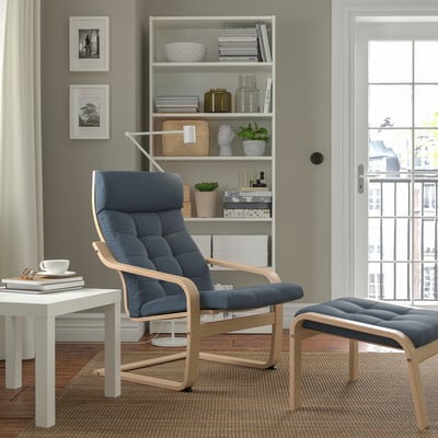 POÄNG armchair: grey, plush, curved wood, cozy room fit. Alternative: POÄNG: grey, comfy armchair with curved wood, fits cozy spaces.