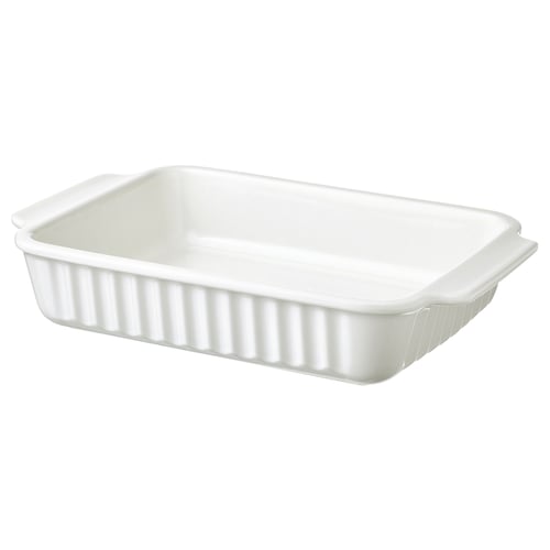 A white oblong baking dish with handles, made of stoneware, designed for various bakes.