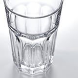 Close-up of clear, empty glass with ridged design, showing transparency and durability.