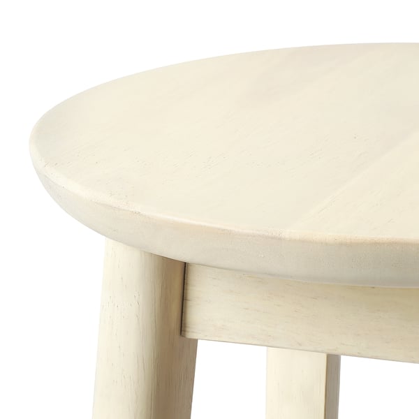 Round wooden bar stool with smooth finish, visible grain, and sturdy legs.