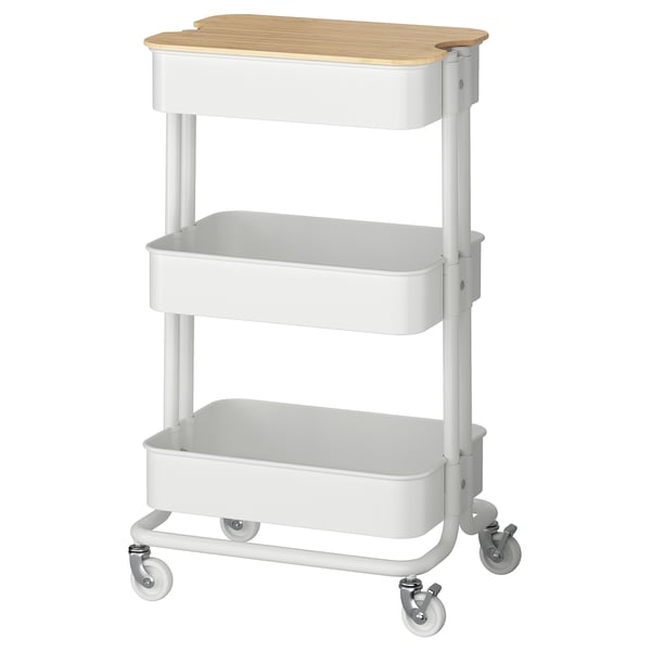 A white RÅSKOG trolley with bamboo top, featuring two shelves and four casters for mobility.