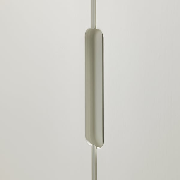Modern floor lamp with sleek design and vertical light.
