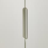 Modern floor lamp with sleek design and vertical light.