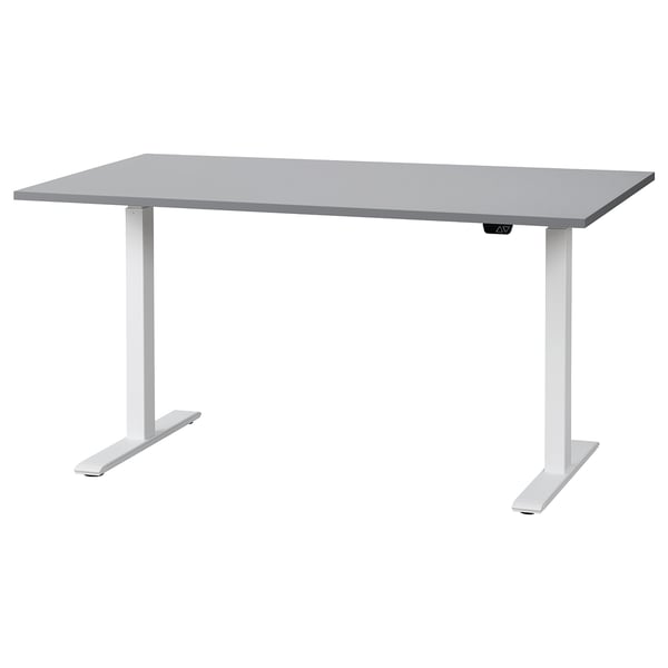 A RODULF sit-stand desk in gray with a sleek, rectangular top and sturdy white legs with adjustable height functionality.