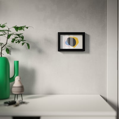 Black RÖDALM picture frame with clear plastic front, designed for various picture placements; modern, versatile, and safe.
