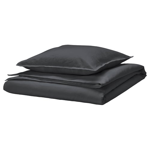 Folded dark grey bed linen set, including duvet cover and pillowcases, neatly stacked. Soft, pre-washed fabric with envelope closure.