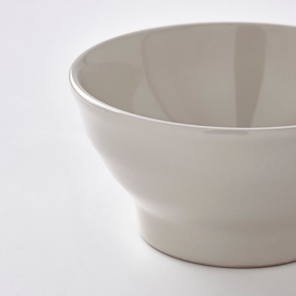 Gray bowl on white surface.