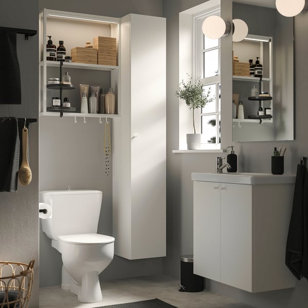 Modern bathroom with SILVERGLANS dimmer & led lights. Minimalist design, white fixtures. Efficient light control.