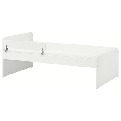 A white SLÄKT bed frame with rounded corners and a guardrail for safety. The design is modern and minimalist, perfectly suited for a childs room.