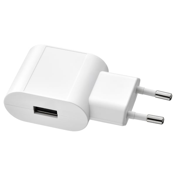 Small white usb wall charger, compact design.