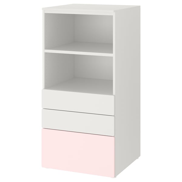 A SMÅSTAD bookcase, white with pink drawers, featuring open shelves and storage for small items.
