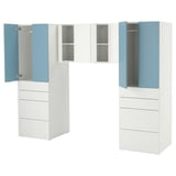 This image the ikea SMÅSTAD wardrobe in white and blue. It includes open and closed storage with soft-close hinges.