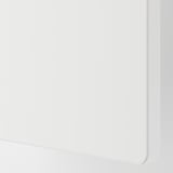 Modern white storage unit with compartments for kids room, soft-close doors.