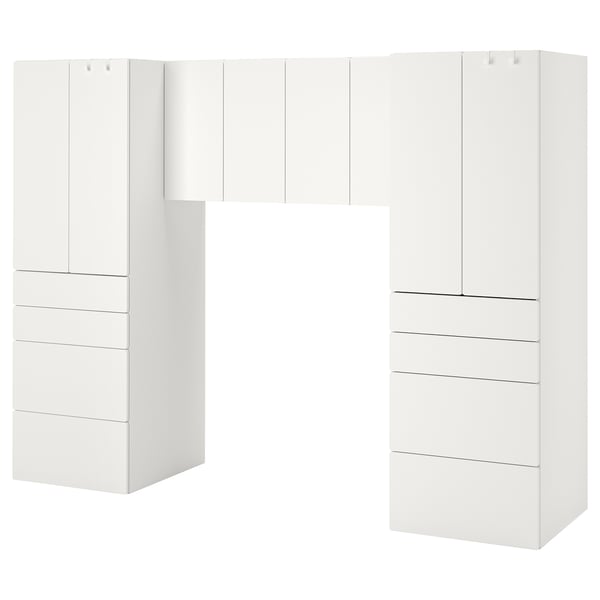 White modular storage unit with cabinets and drawers. Modern, minimalist design, ideal for organizing and maximizing space.