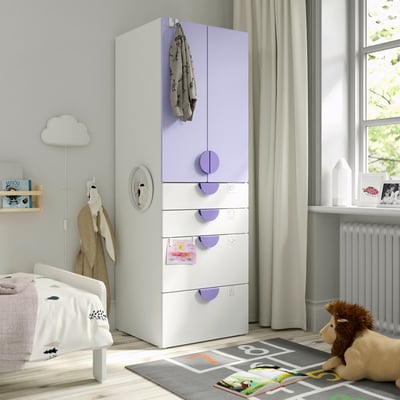 Room with SMÅSTAD wardrobe, teddy bear, jacket, bookshelf.
