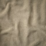 Soft, plush fabric cover with subtle sheen and textured weave, felted from marled yarns.