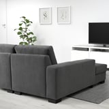 Modern grey SÖRVALLEN sofa with chaise longue in minimalist living room