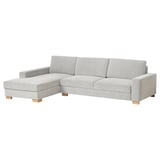SÖRVALLEN modern light grey l-shaped sofa with minimalist design, sturdy wood legs, and plush cushions.