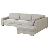 A grey SÖRVALLEN three-seat sofa with a minimalist design and light wooden legs.