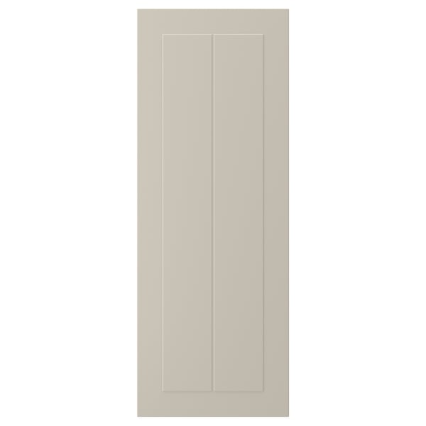 A beige STENSUND cabinet door with a smooth, framed design.