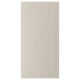 A beige STENSUND cabinet door with a framed, grooved panel design. The door has a smooth, lacquered surface.