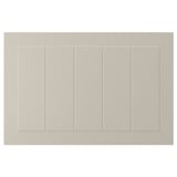 A beige STENSUND cabinet door with a rectangular shape and grooved panel design, made of fiberboard.