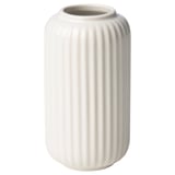 A white, cylindrical STILREN vase. Made of stoneware with a glossy finish, it has vertical ridges and a simple, elegant design.