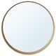 Option: A STOCKHOLM mirror with a light oak frame and a round shape. The frame has a shelf at the bottom.