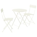 White metallic bistro set with round table and two folding chairs.