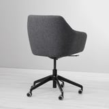 Modern swivel chair with dark grey fabric, soft padding, and sturdy castors.