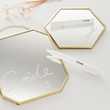 Two hexagonal frames with smile and love written in chalk. Two TOTEBO chalk pens nearby, one open.