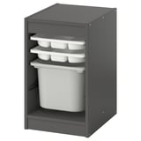 Grey TROFAST storage with white bins for kids items.