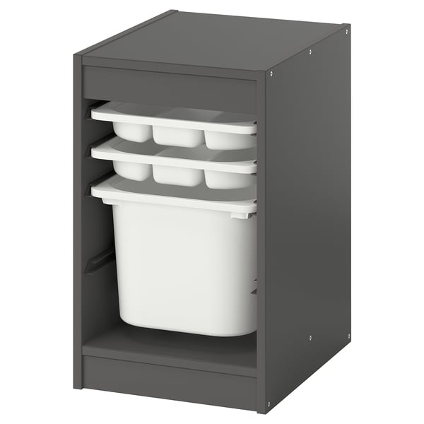 A gray TROFAST storage unit with white containers and trays. It has an open front and multiple compartments for organizing items.