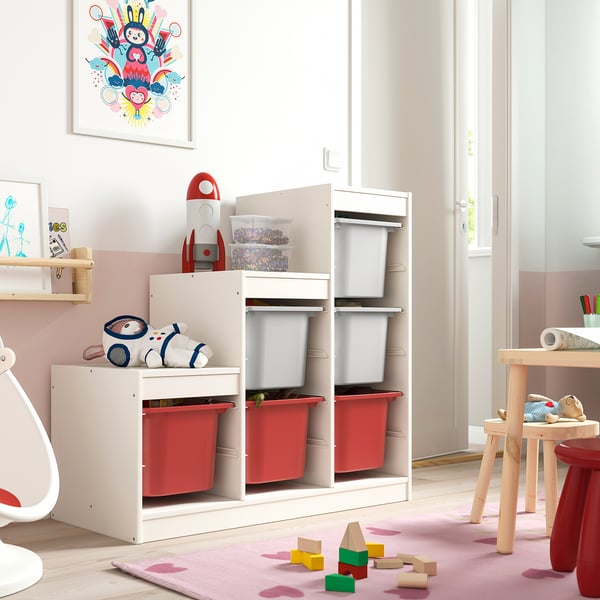 TROFAST storage with red/gray bins for kids toys.