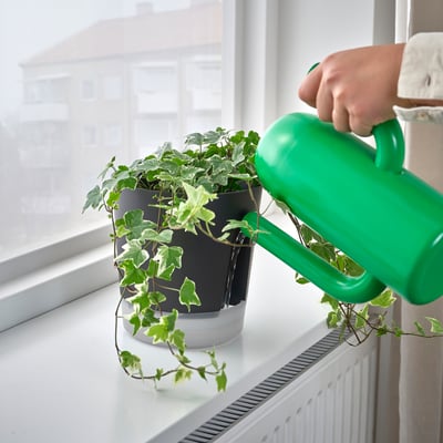 Black & white self-watering planter with handle