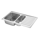 A double-basin kitchen sink named VATTUDALEN, made of stainless steel. It a reversible drainboard and a modern, sleek design.