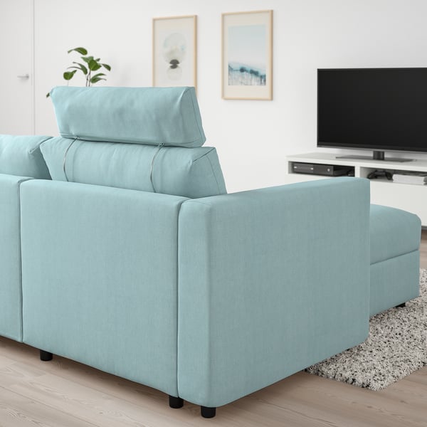 IKEA VIMLE light blue sofa section in modern living room, with tv and plant.