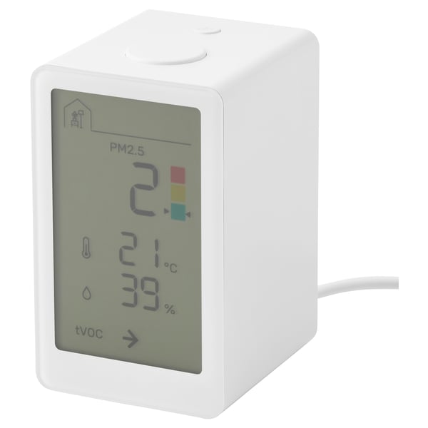White VINDSTYRKA air monitor displays pm2. 5, temp, humidity, voc.