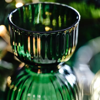 Green striped glass vase. Part of the VINTERFINT collection.