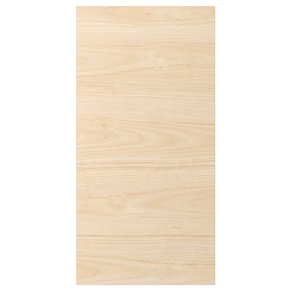 Un panneau en bois de couleur cendrée claire de la collection ASKERSUND. Il a une finition en mélamine, durable et facile à nettoyer.