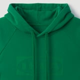 Sweat à capuche vert vif avec cordon de serrage ; Coton de qualité, design simple et élégant.