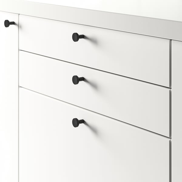 Commode blanche à quatre tiroirs, chacun sécurisé par des boutons noirs, adapté à différentes épaisseurs de porte.