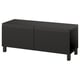 Meuble tv BESTÅ noir, design moderne et élégant avec des surfaces lisses et des étagères réglables.